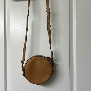 Cute vegan leather round crossbody.
